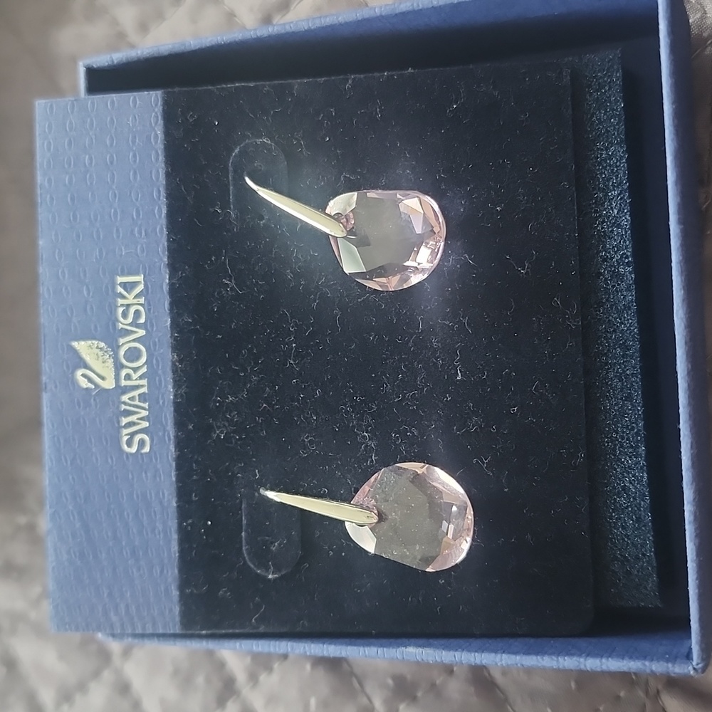 Authentic Swarovski Earrings pe/lake color,  purple tones